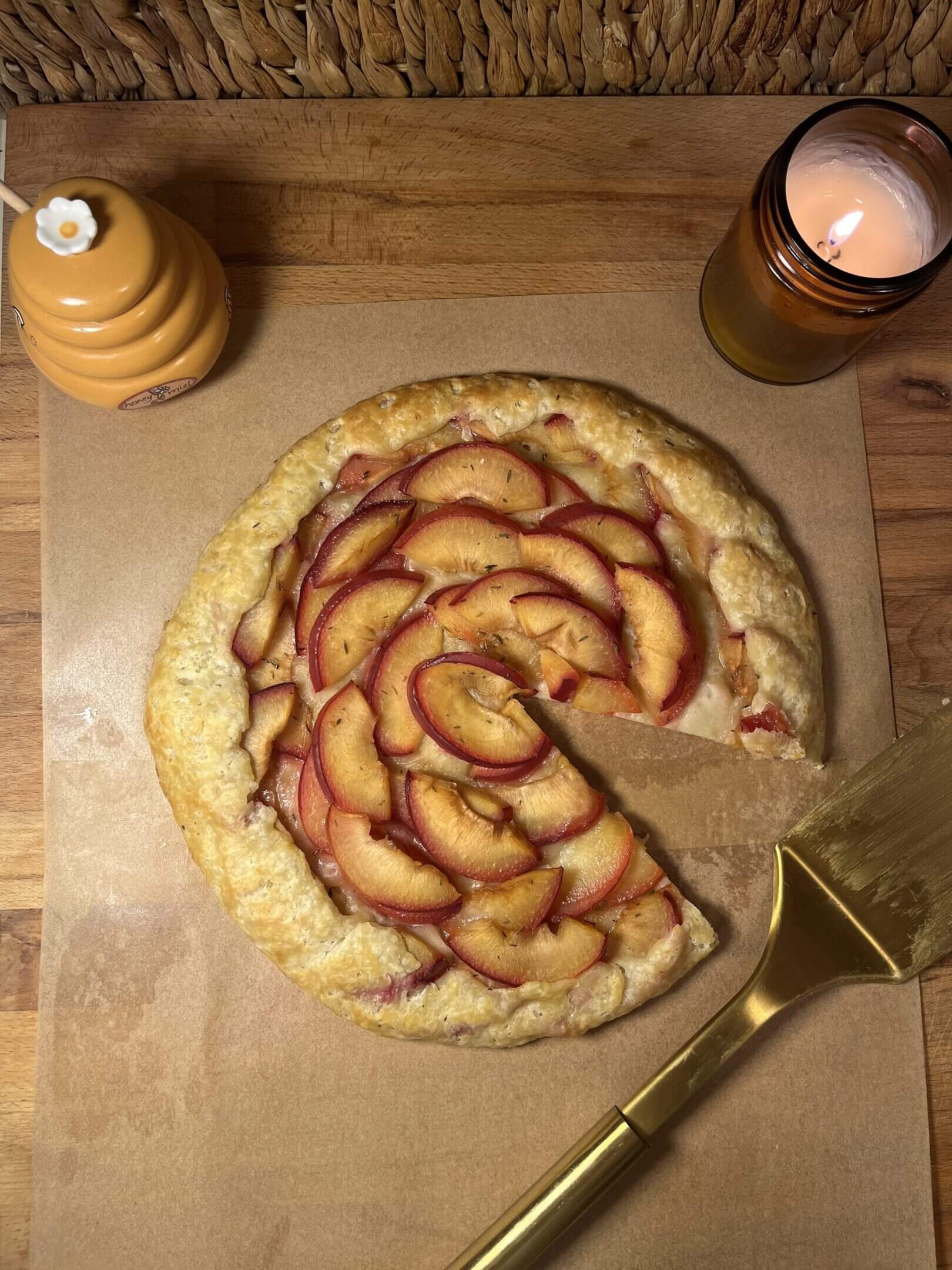 Peach galette with a missing slice.