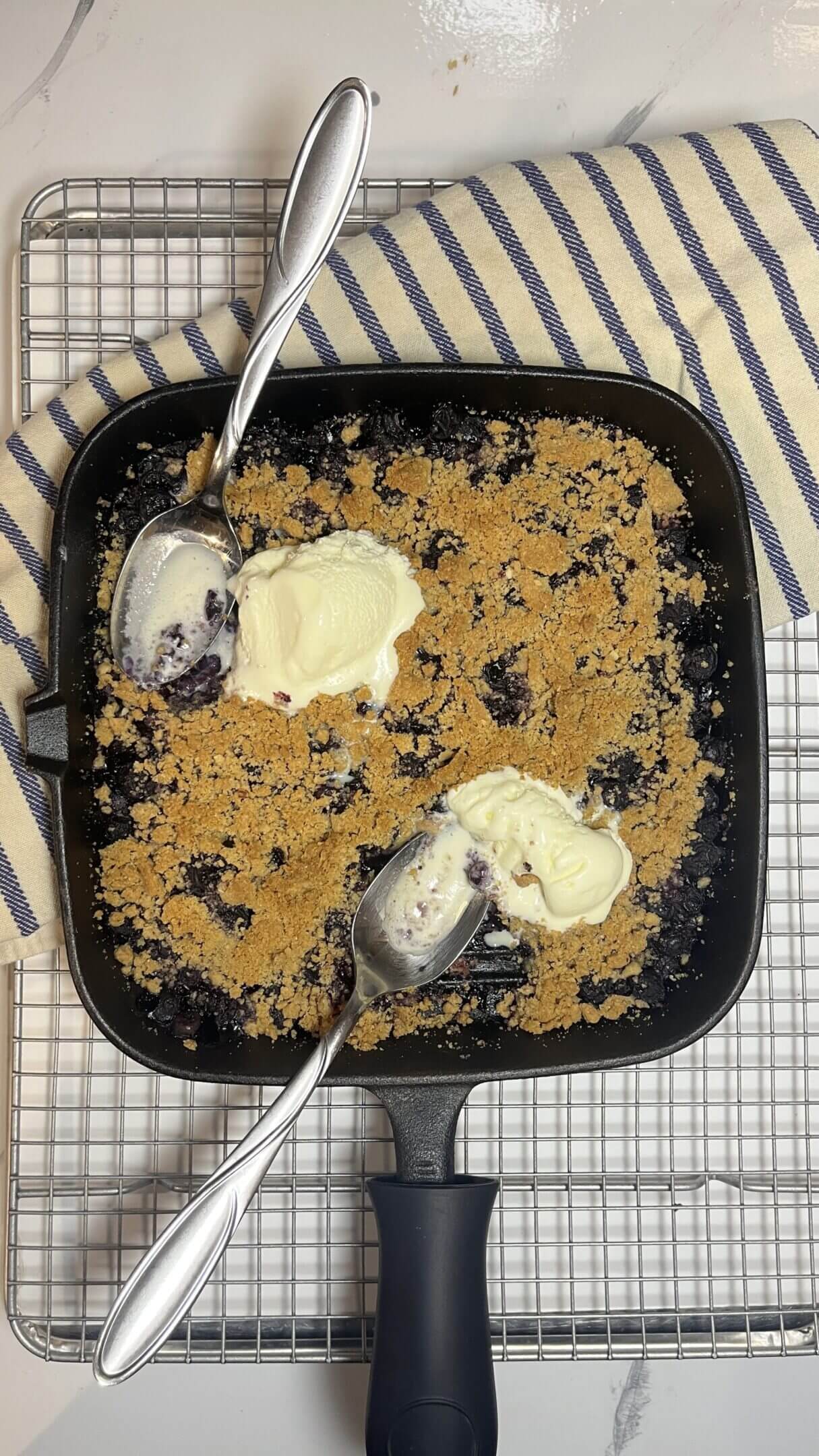 Blueberry crumble with vanilla ice cream.