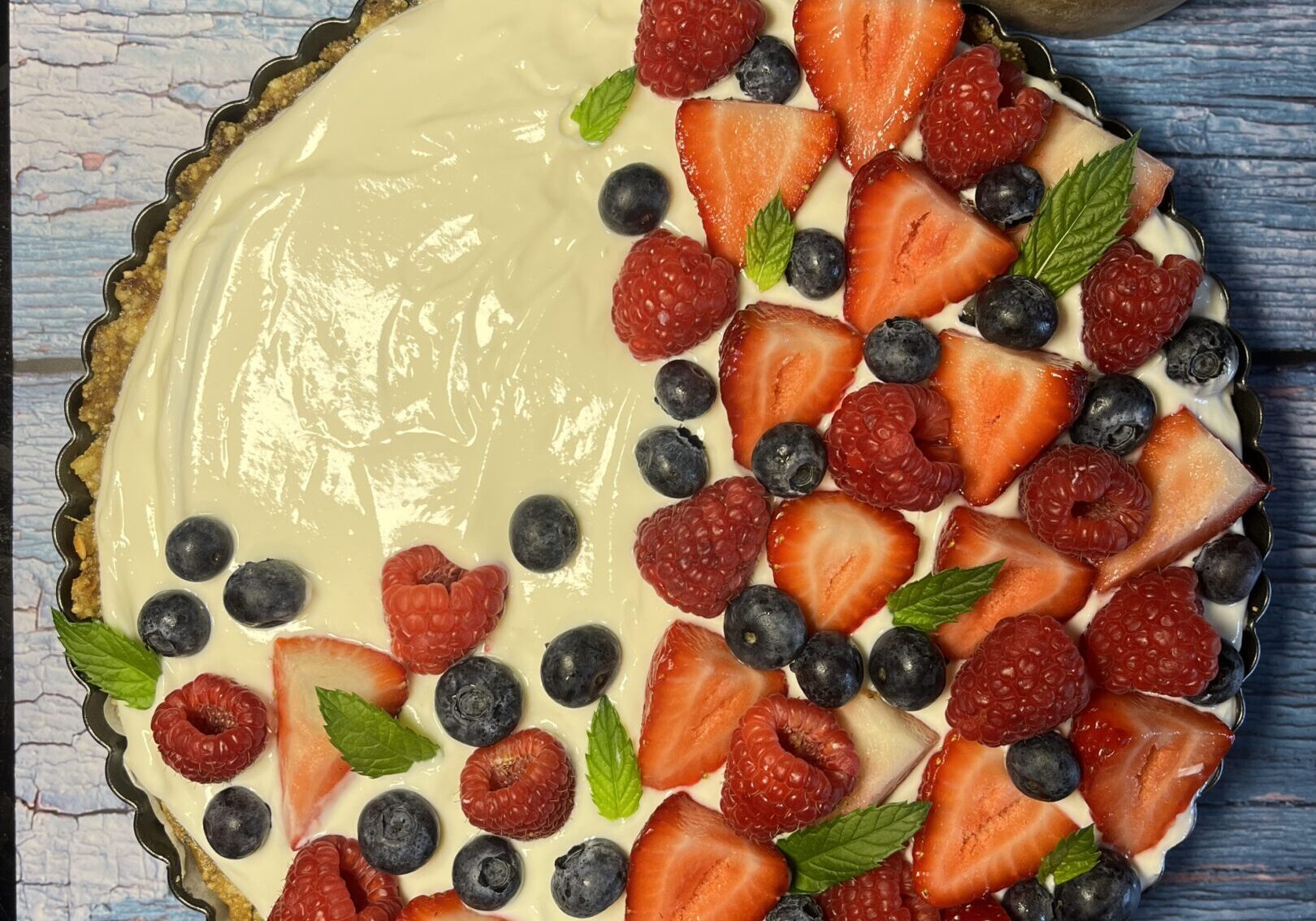 Berry tart with strawberries and blueberries.