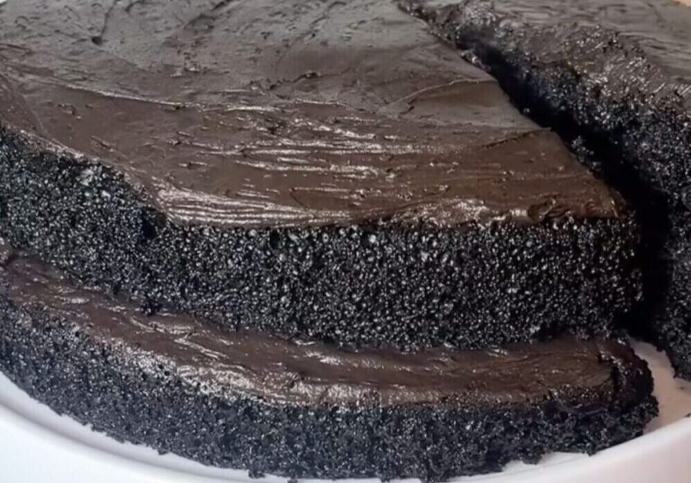 Chocolate cake with a slice missing.