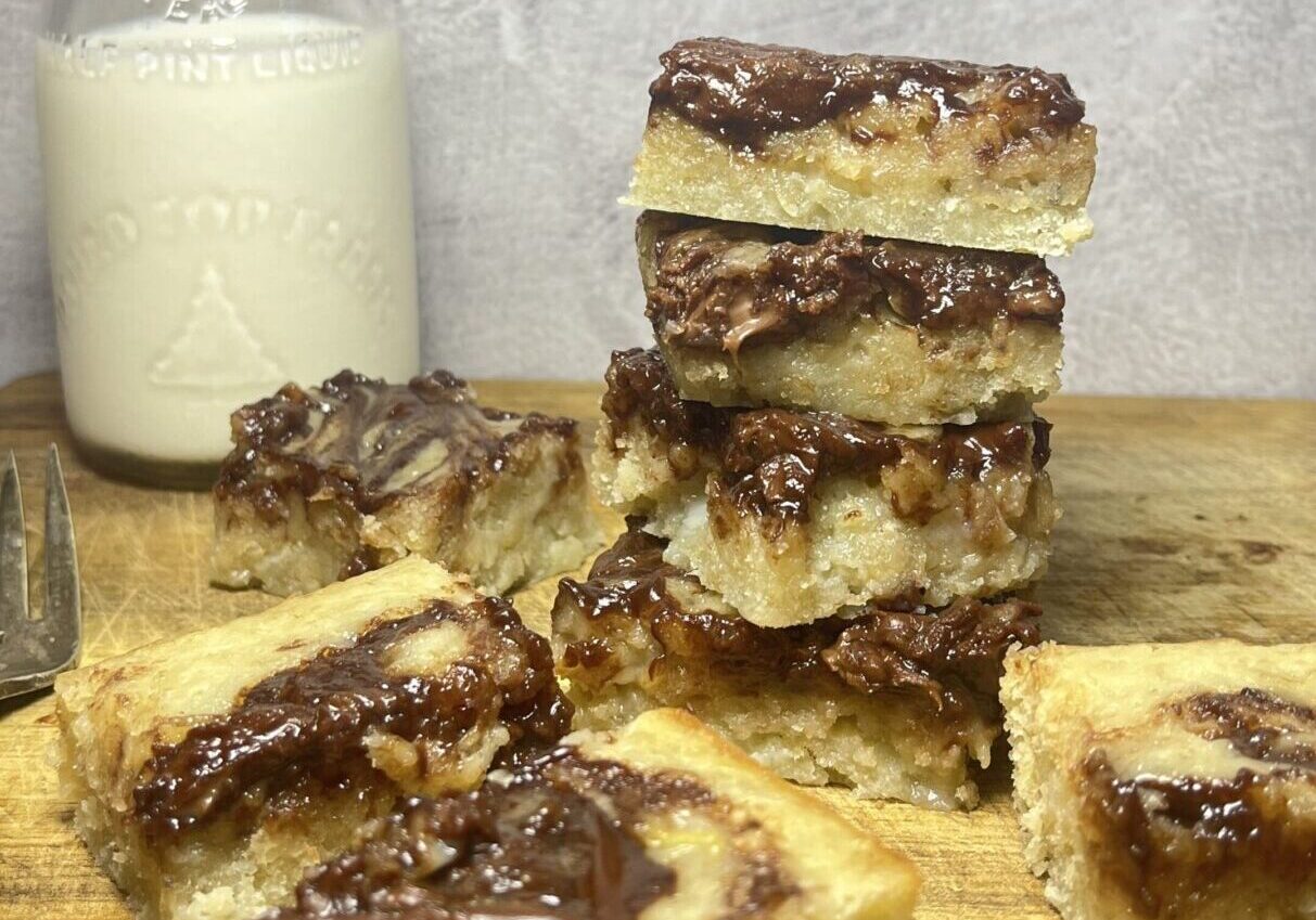Chocolate-topped bars with milk bottle.