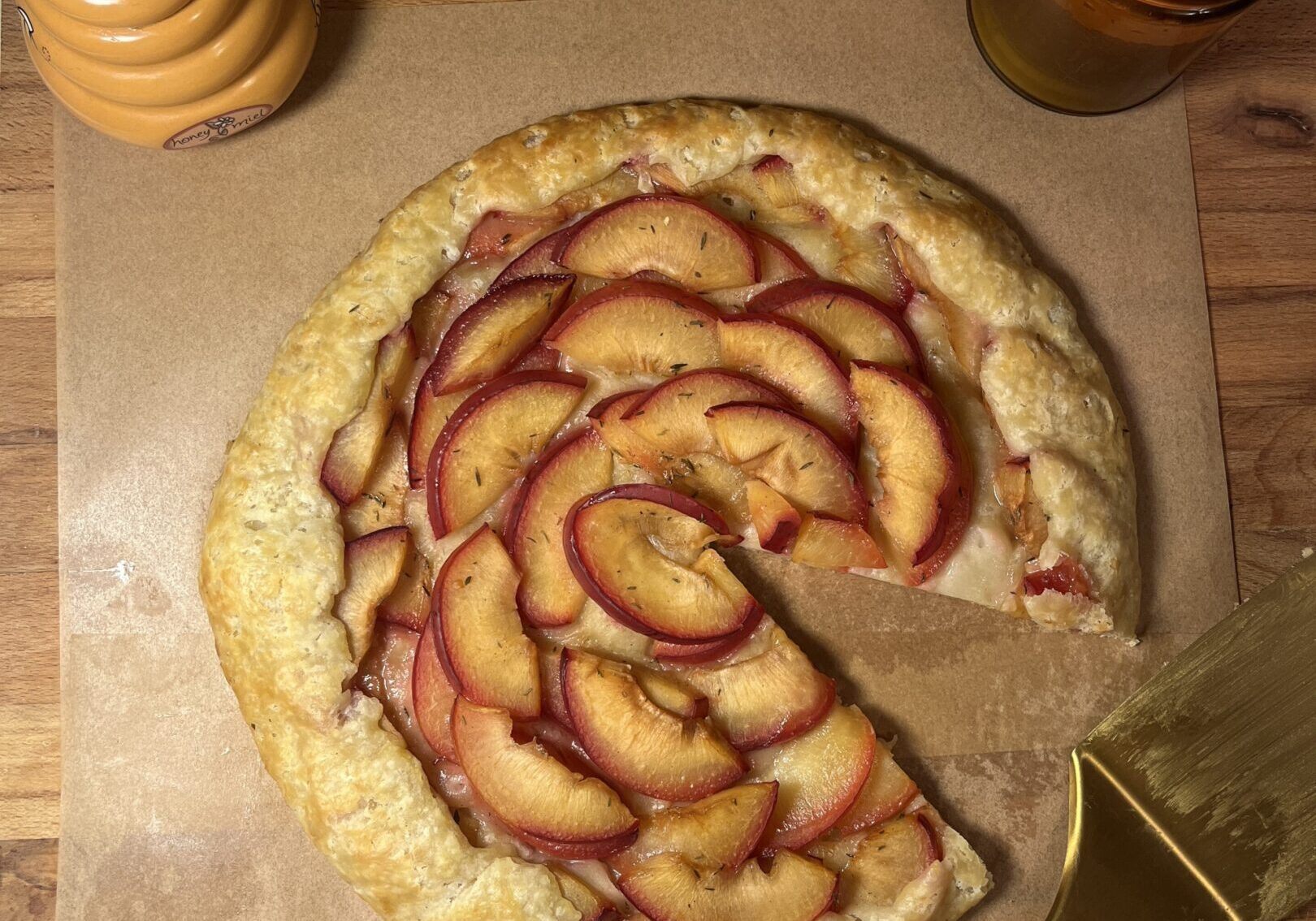 Peach galette with a missing slice.