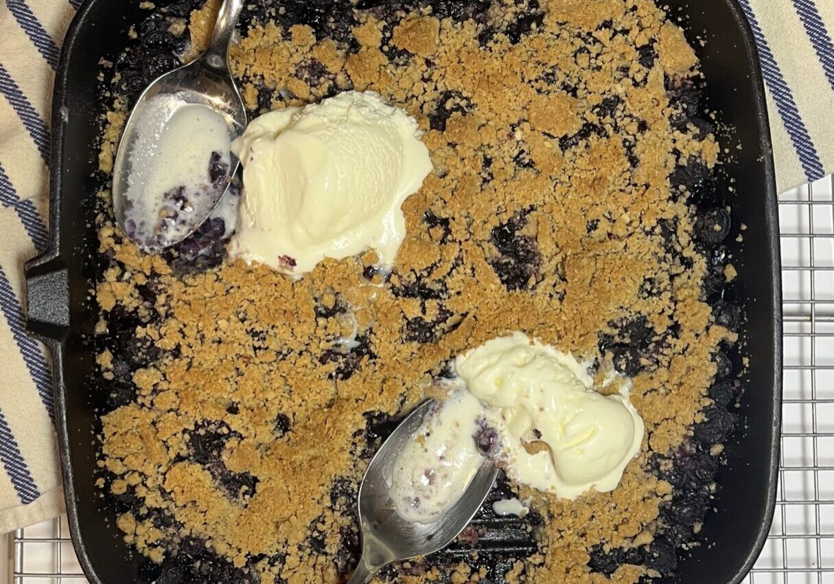 Blueberry crumble with vanilla ice cream.